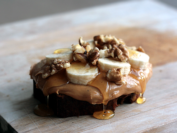 banana flaxseed bread with peanut butter, bananas, honey and walnuts