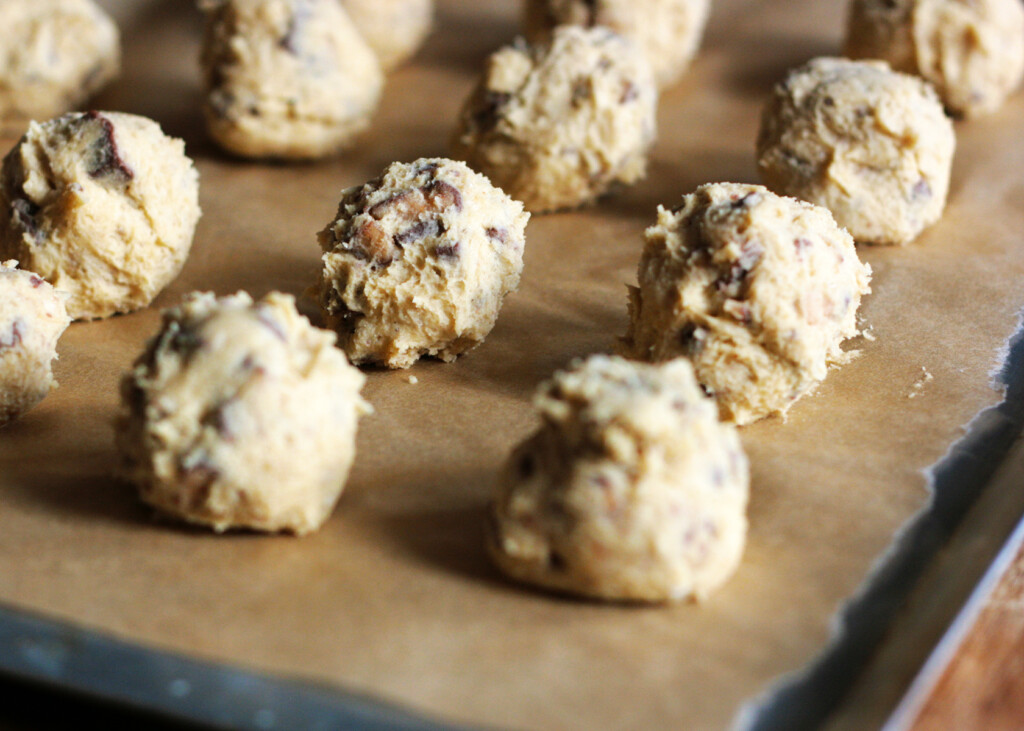 toffee heath bar cookie dough balls on baking sheet