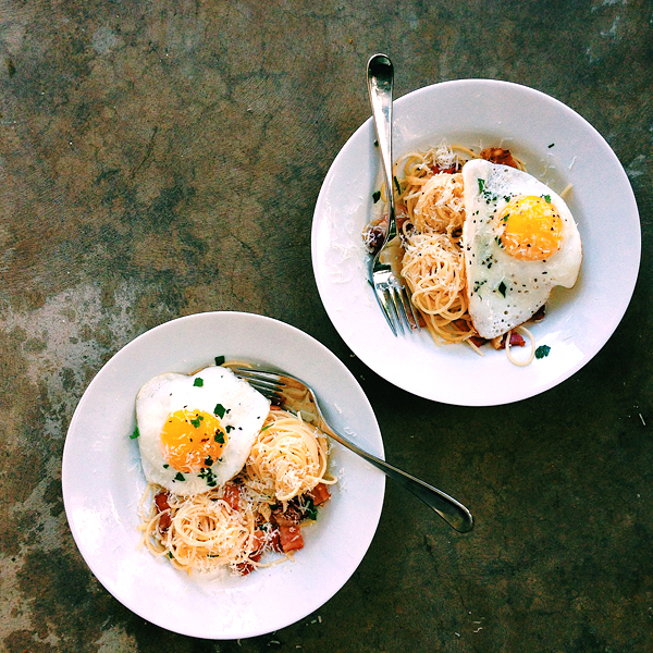 breakfast carbonara pasta with sunny egg