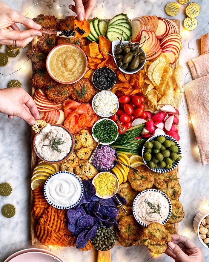 latkes smoked salmon and caviar appetizer and snacks board for hanukkah