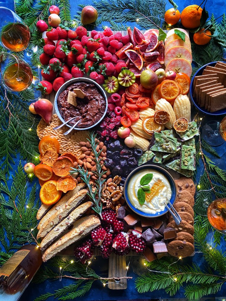 dessert charcuterie board with chocolate spread and honey whipped ricotta