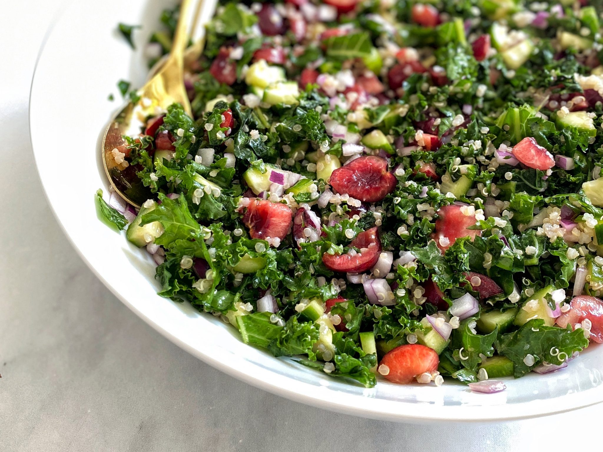 quinoa tabbouleh with kale and cherries, closeup detail