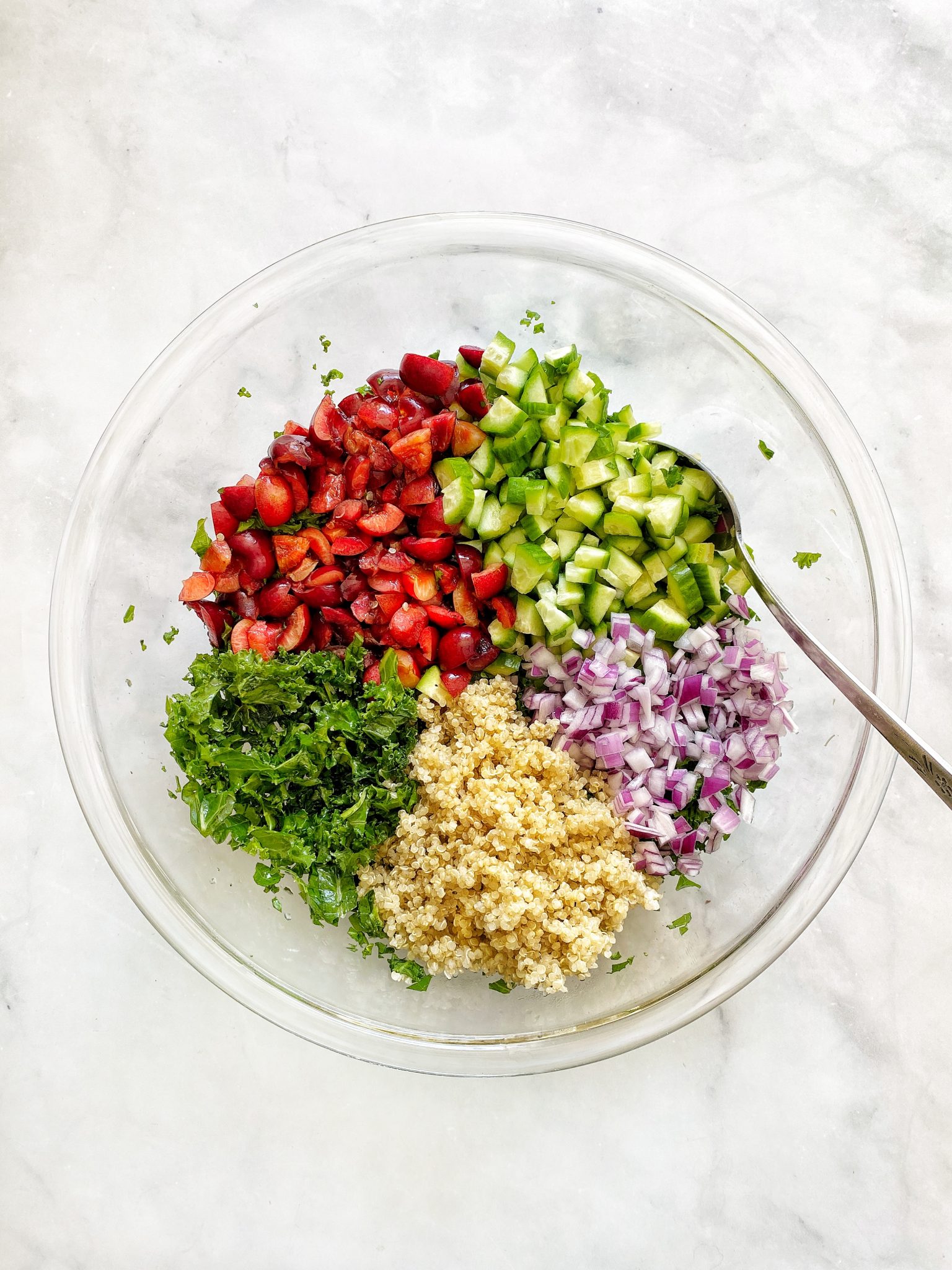 quinoa tabbouleh with kale and cherries, mixing bowl