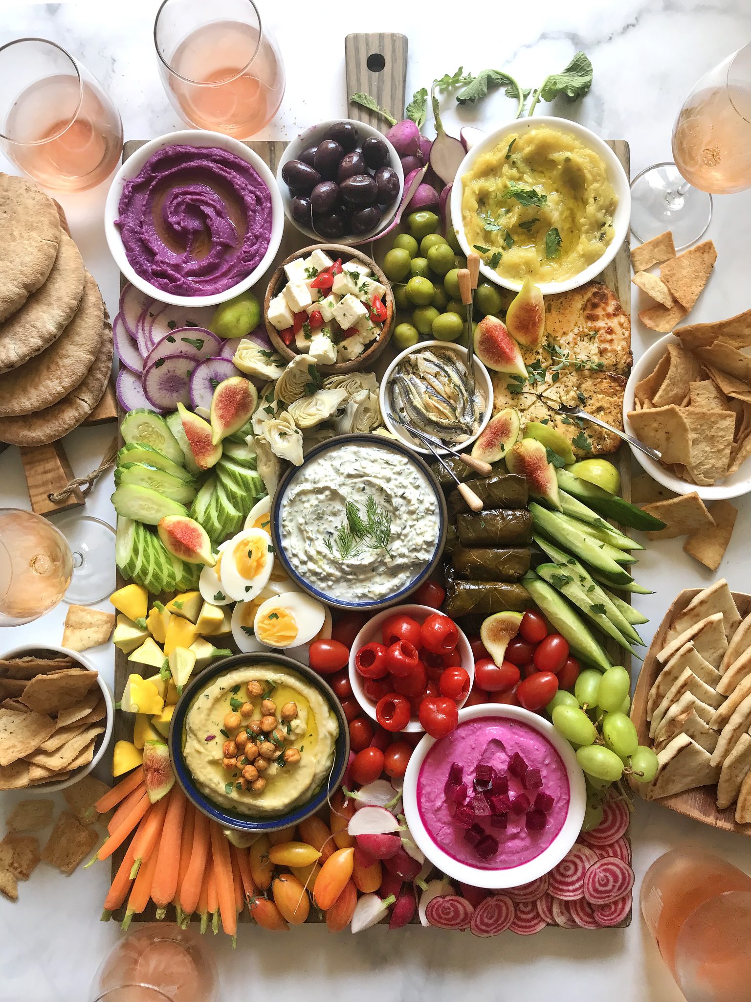 mediterranean mezze platter with wine