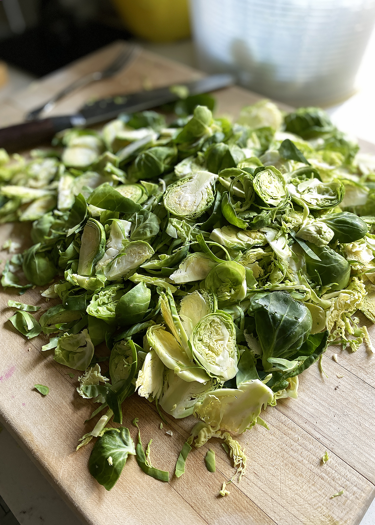 brussels sprouts shredded on cutting board