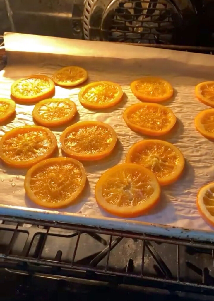 orange slices on baking sheet in oven