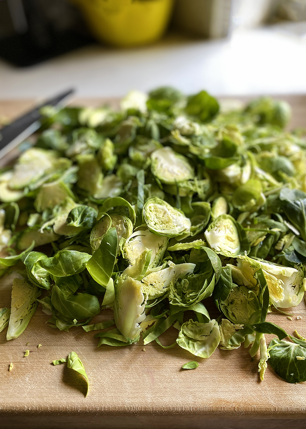 brussels sprouts shredded on cutting board
