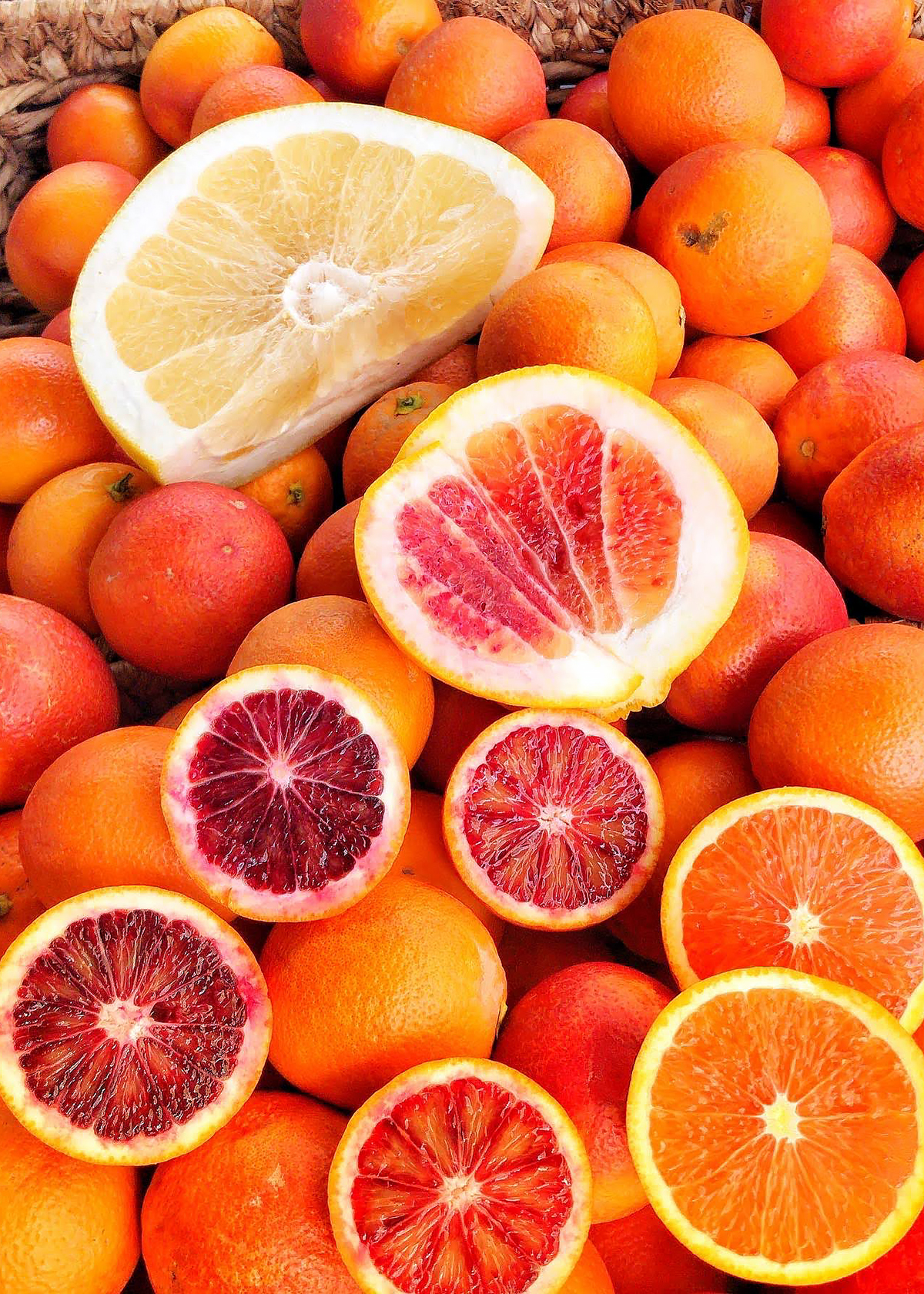pomelo blood oranges and cara cara oranges at farmers market