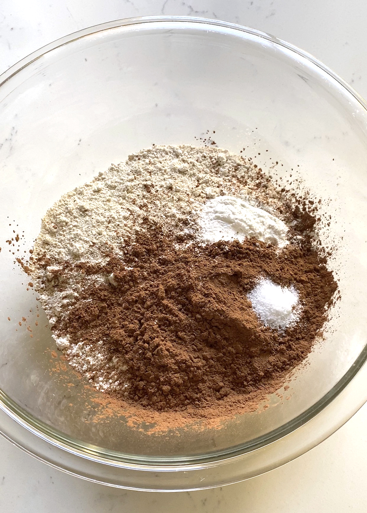 oat flour, cocoa, baking powder, and salt dry ingredients in mixing bowl