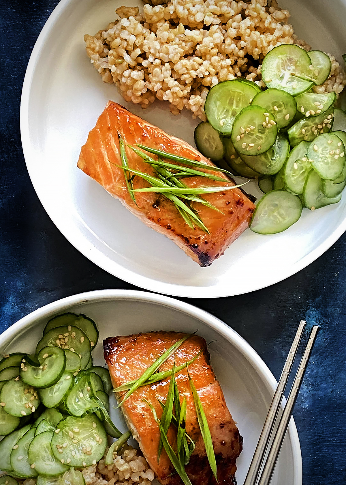 miso salmon with brown rice bowl, blue background