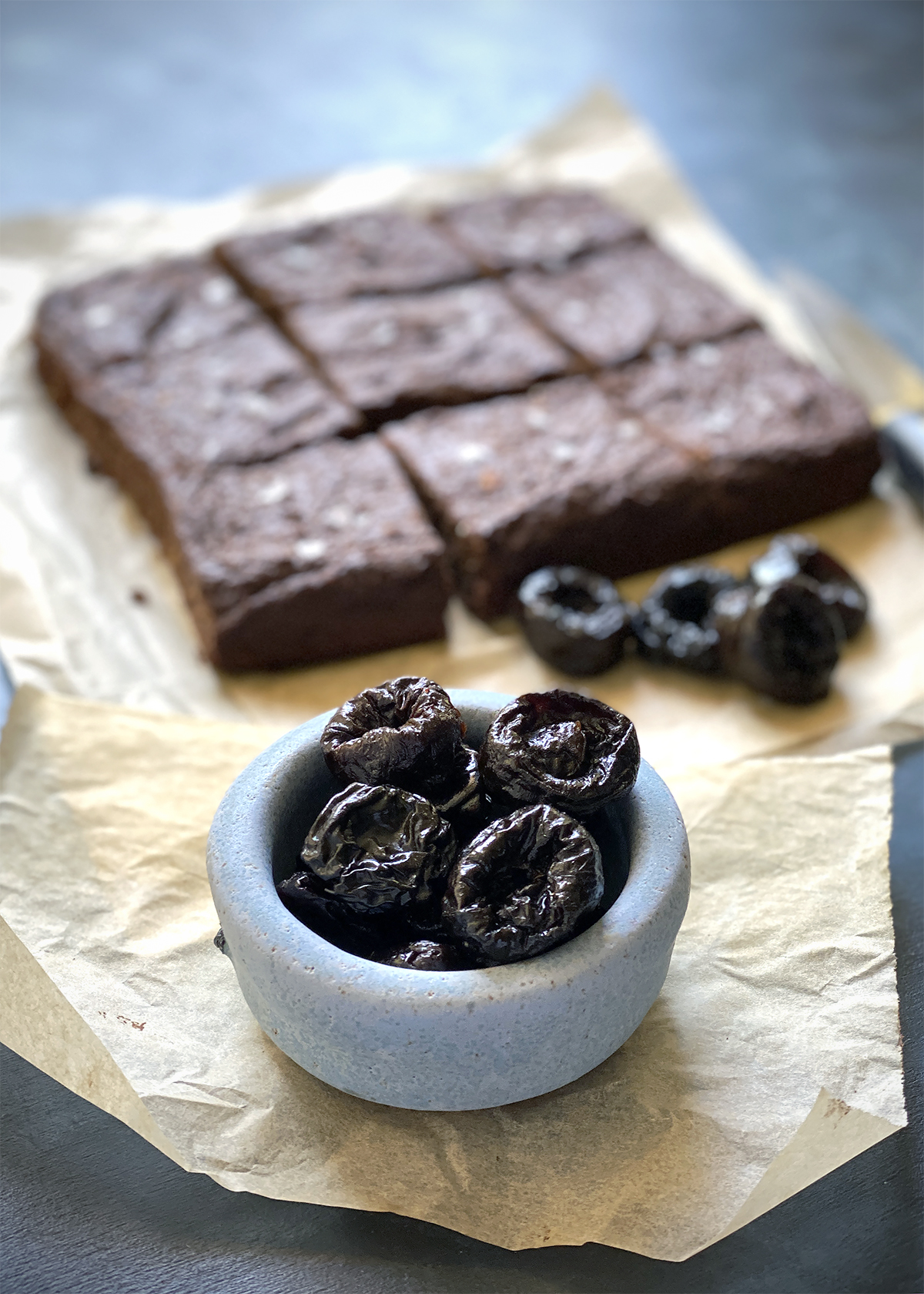 prunes in ceramic bowl for baked goods