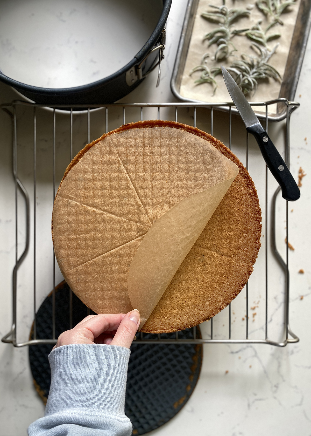 inverted cake, removing parchment paper liner