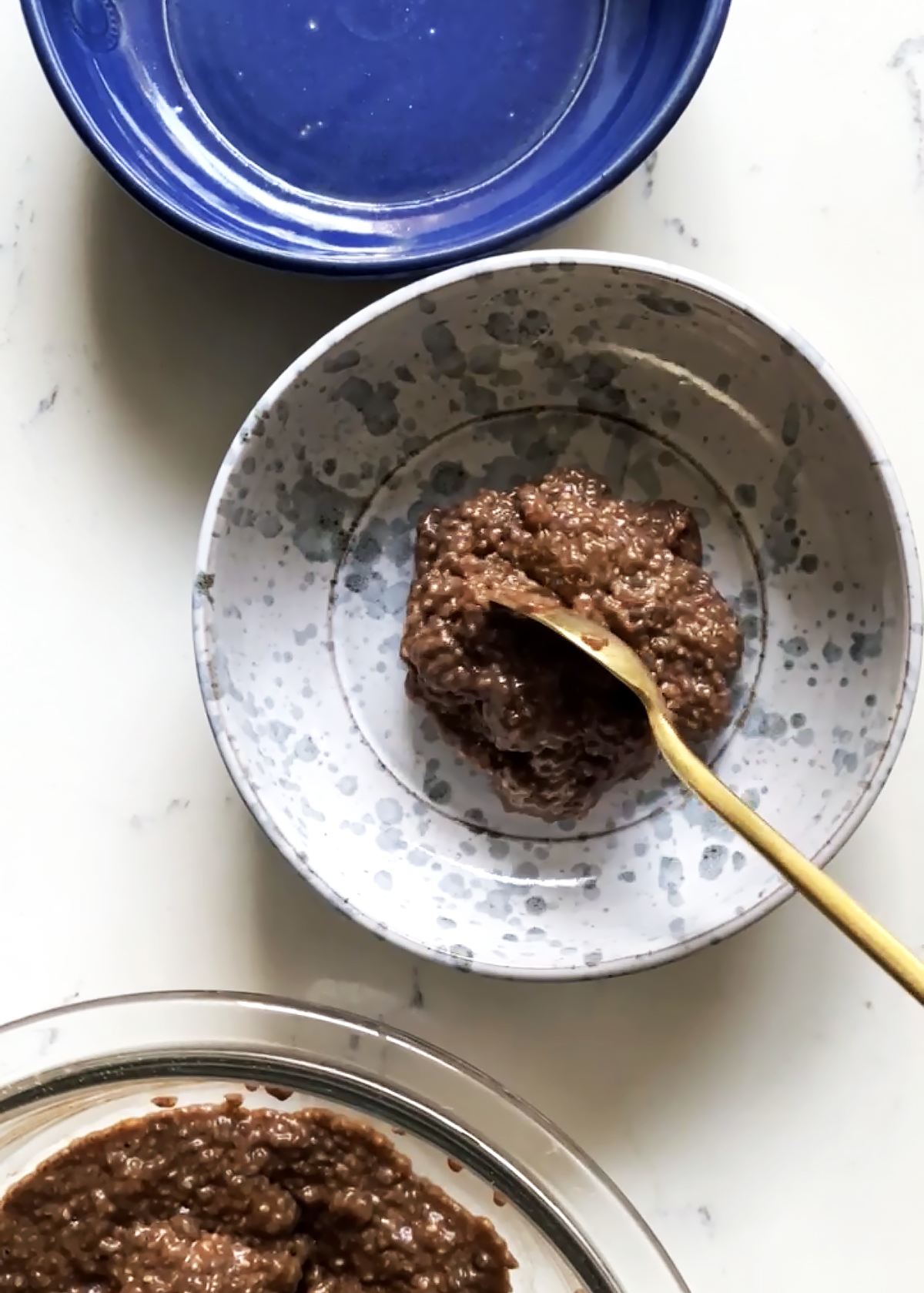 chocolate chia seed pudding into serving bowls