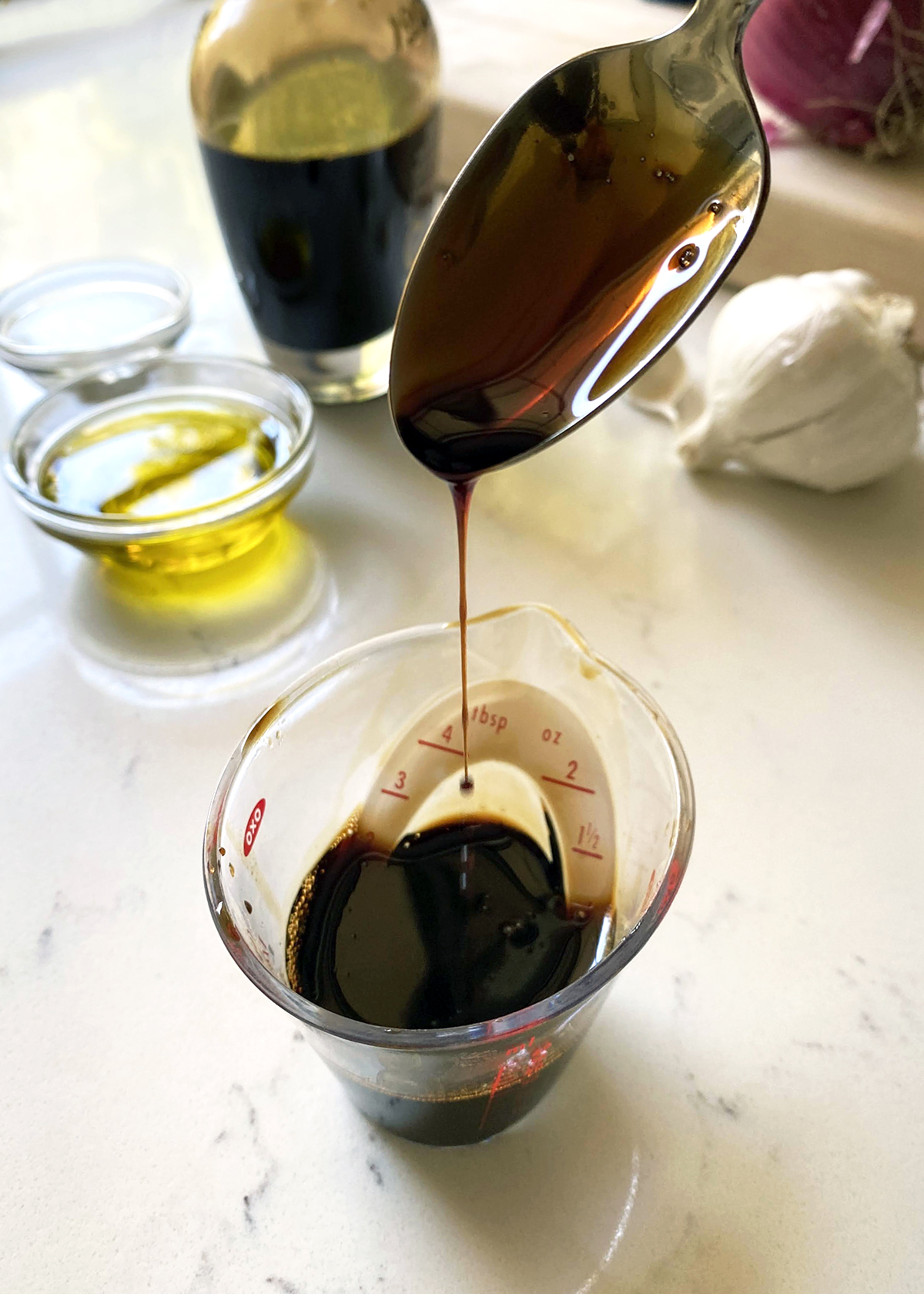 balsamic vinegar on spoon to show viscosity