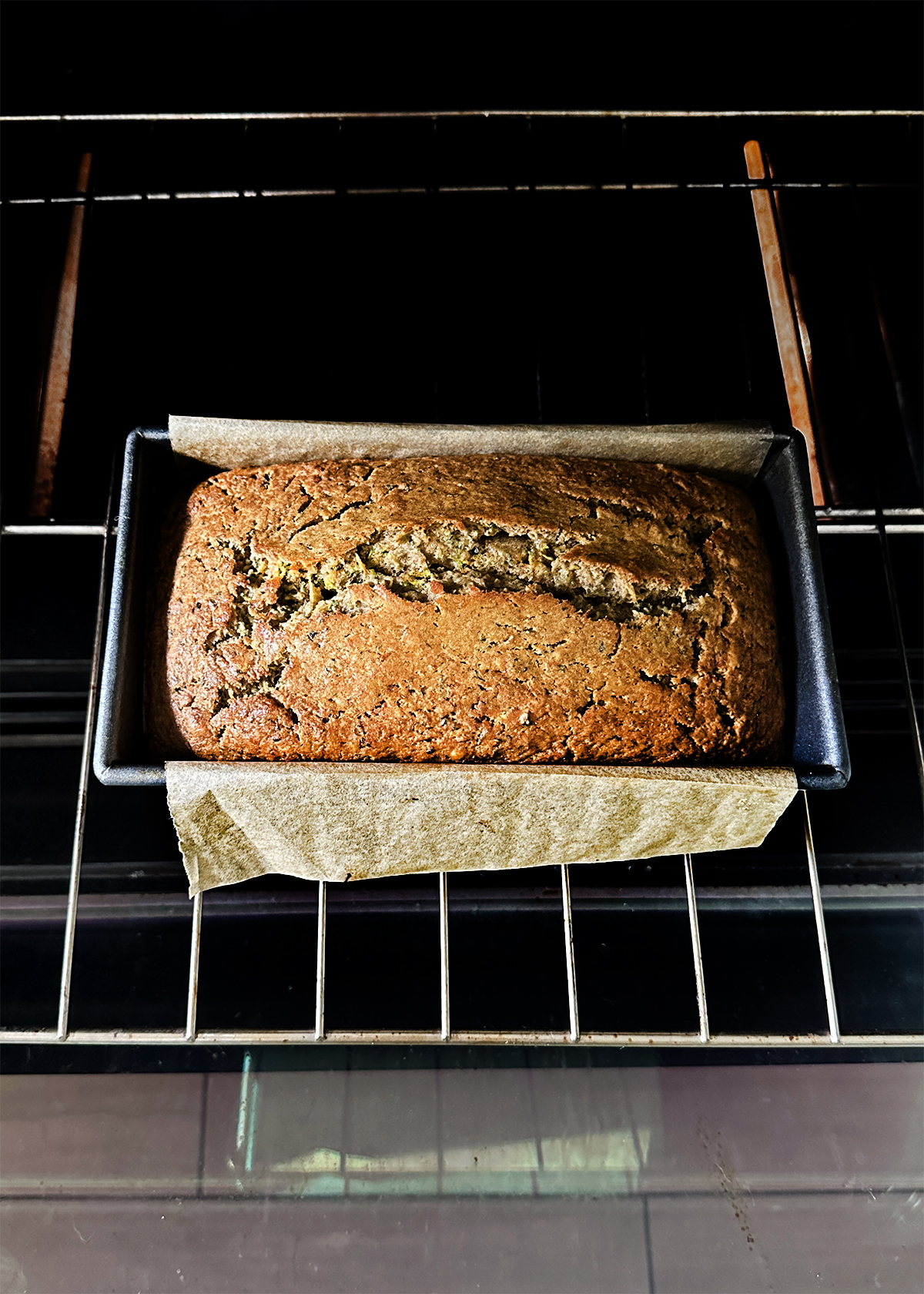 zucchini bread loaf in oven