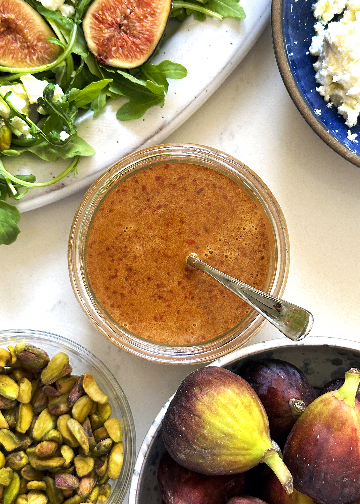 hot honey balsamic vinaigrette dressing in bowl on side