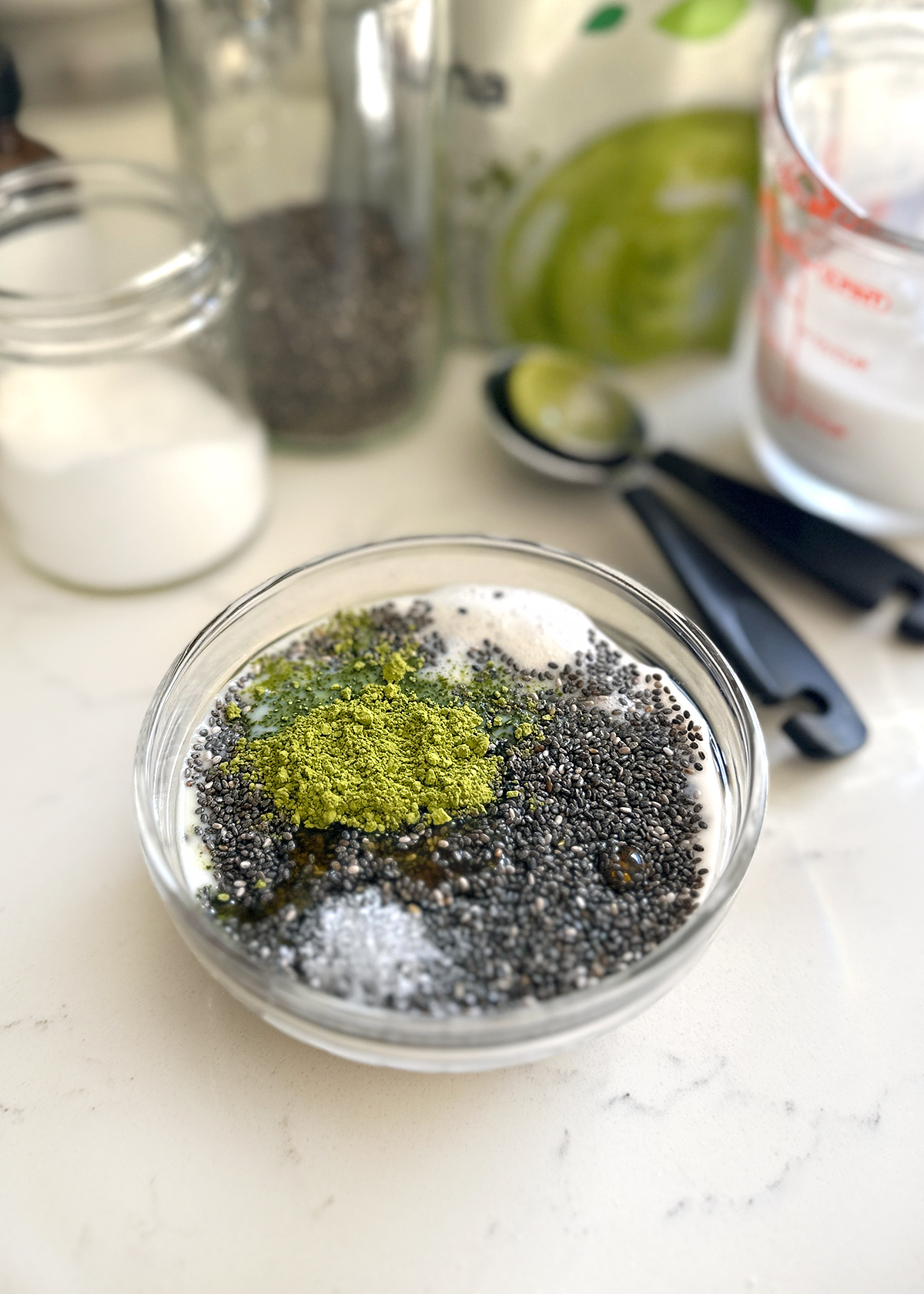 matcha chia seed ingredients in mixing bowl