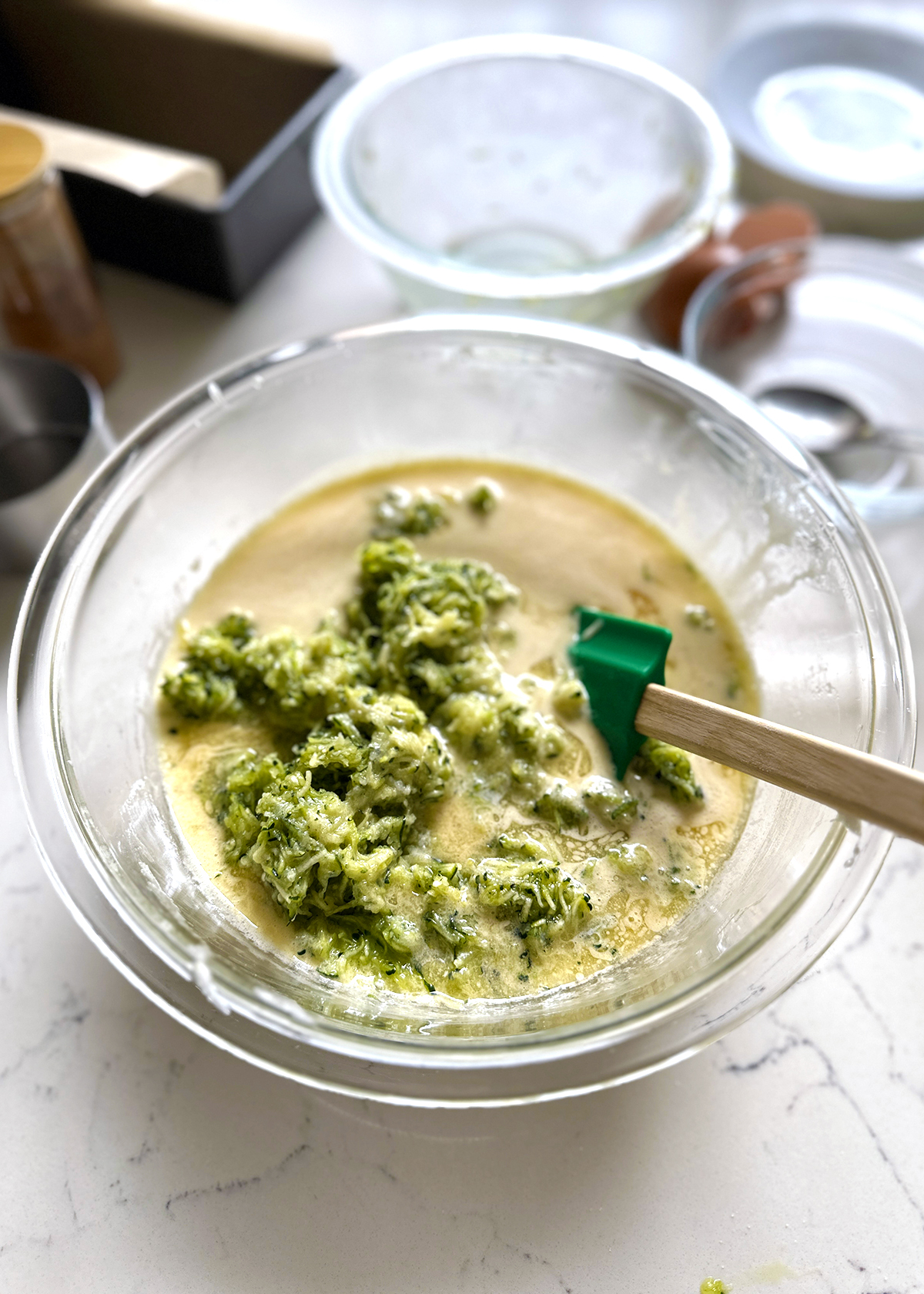 shredded zucchini in wet ingredients