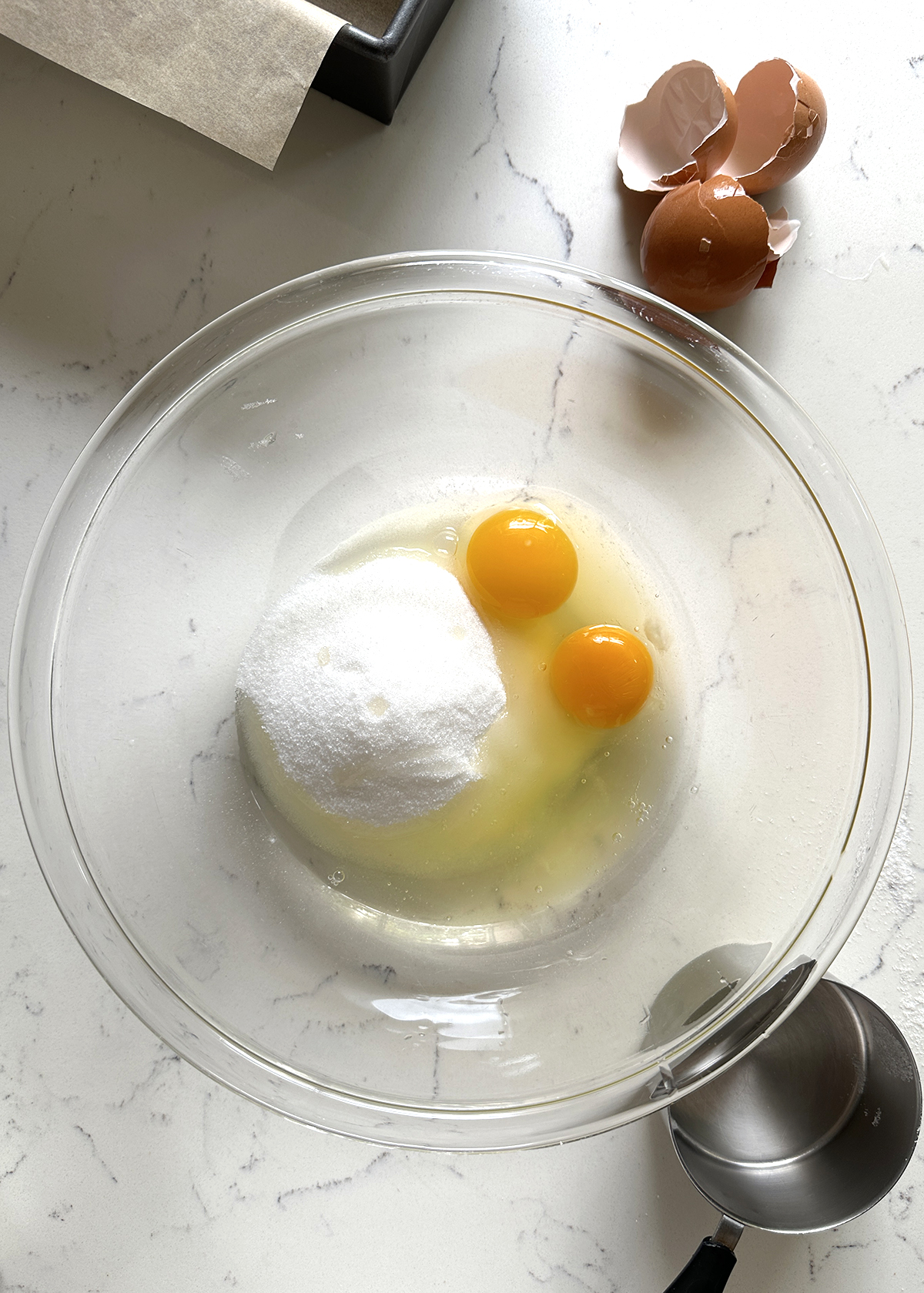 sugar and eggs in mixing bowl for zucchini bread