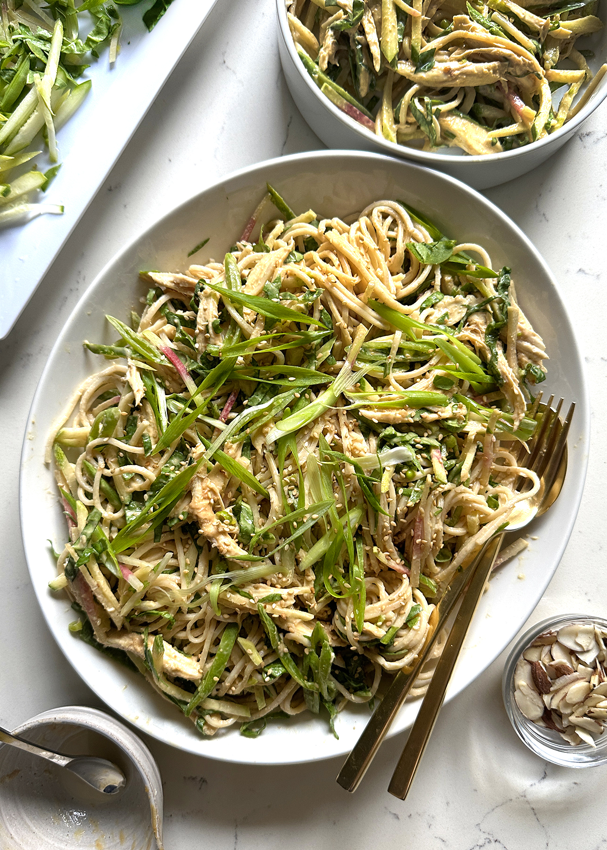 soba noodle salad on oval platter