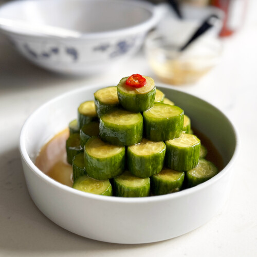 spicy cucumbers slices stacked in bowl