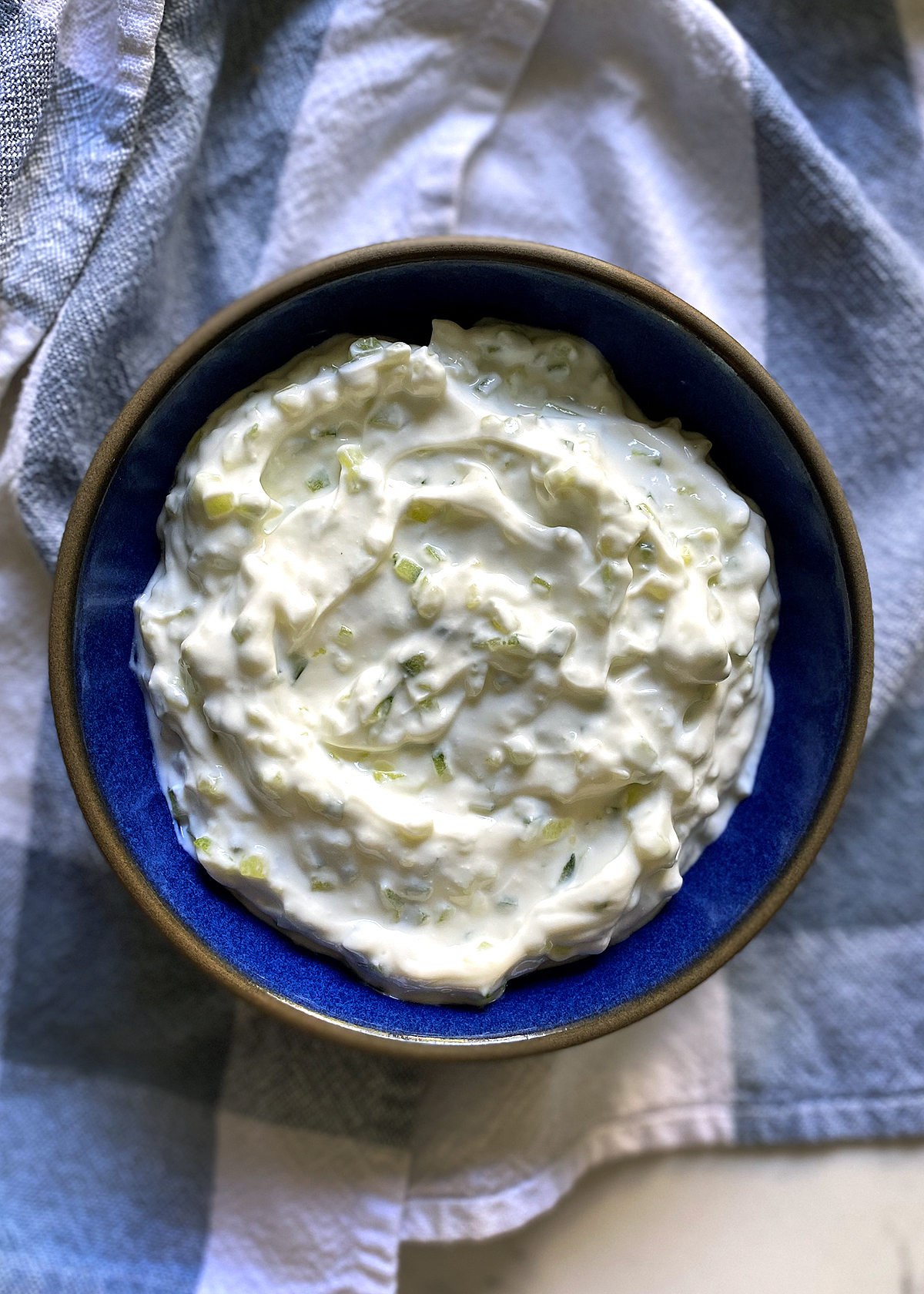 finished tzatziki in blue bowl