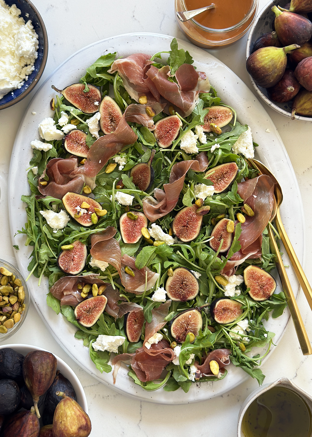 arugula fig salad on platter