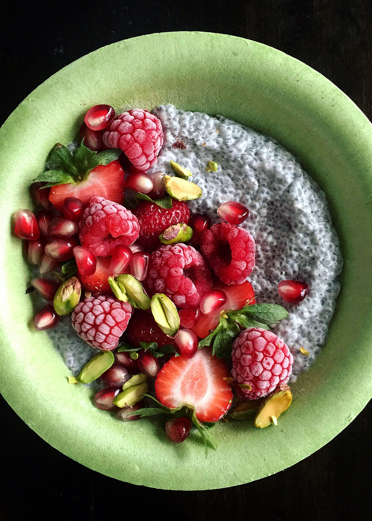 chia seed pudding with strawberries, raspberries, pomegranate