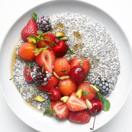 chia seed pudding with strawberries and cherries