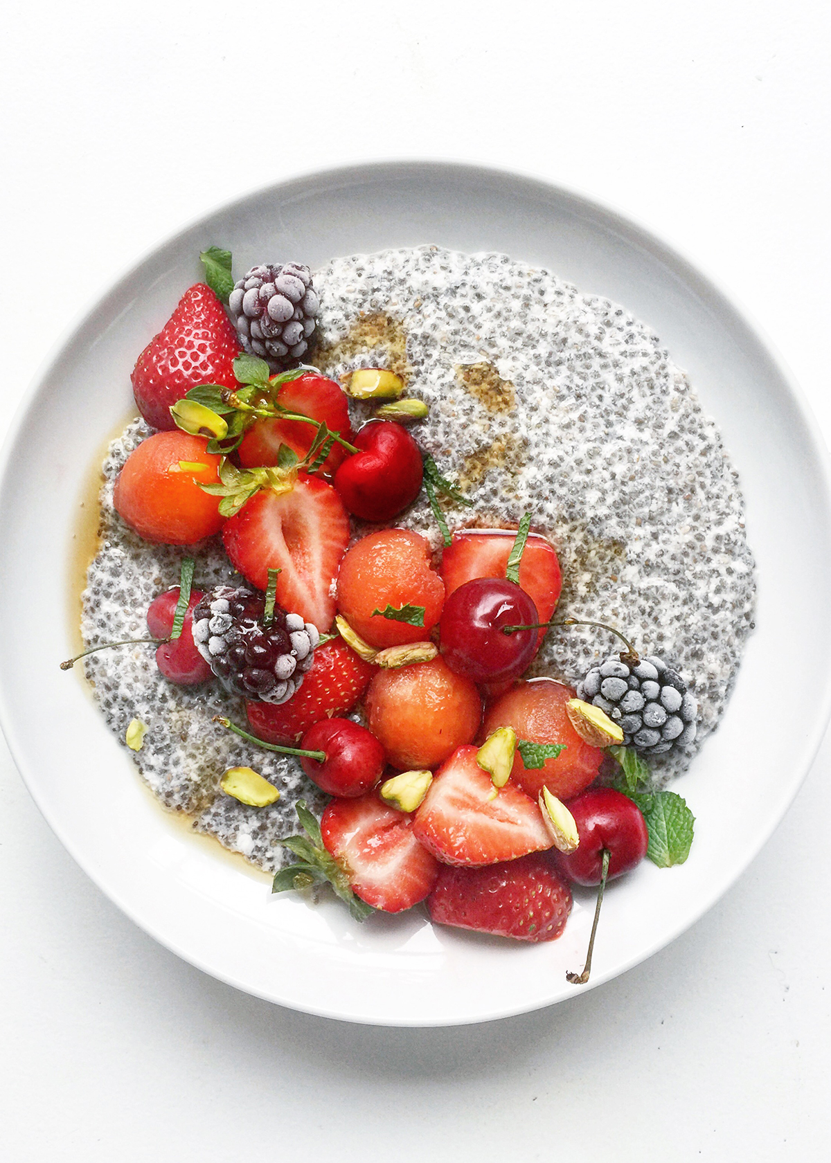 chia seed pudding with strawberries and cherries