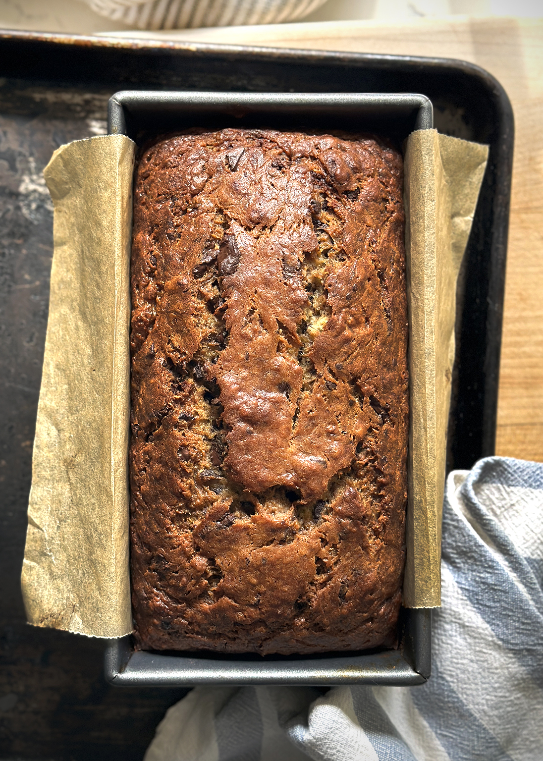 chocolate chip banana bread in pan, baked