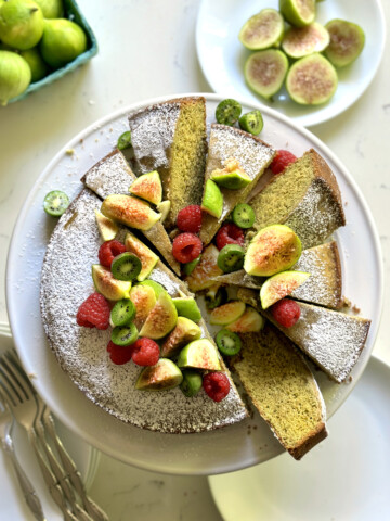 matcha olive oil cake, sliced on cake plate