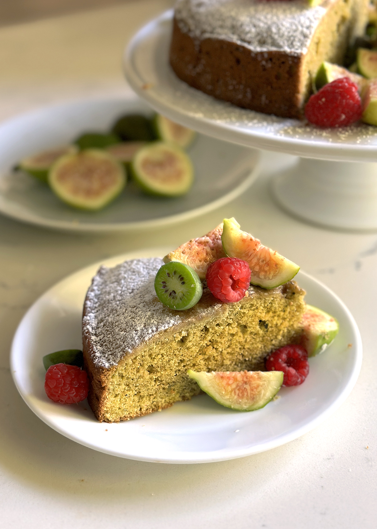 matcha olive oil cake slice on plate