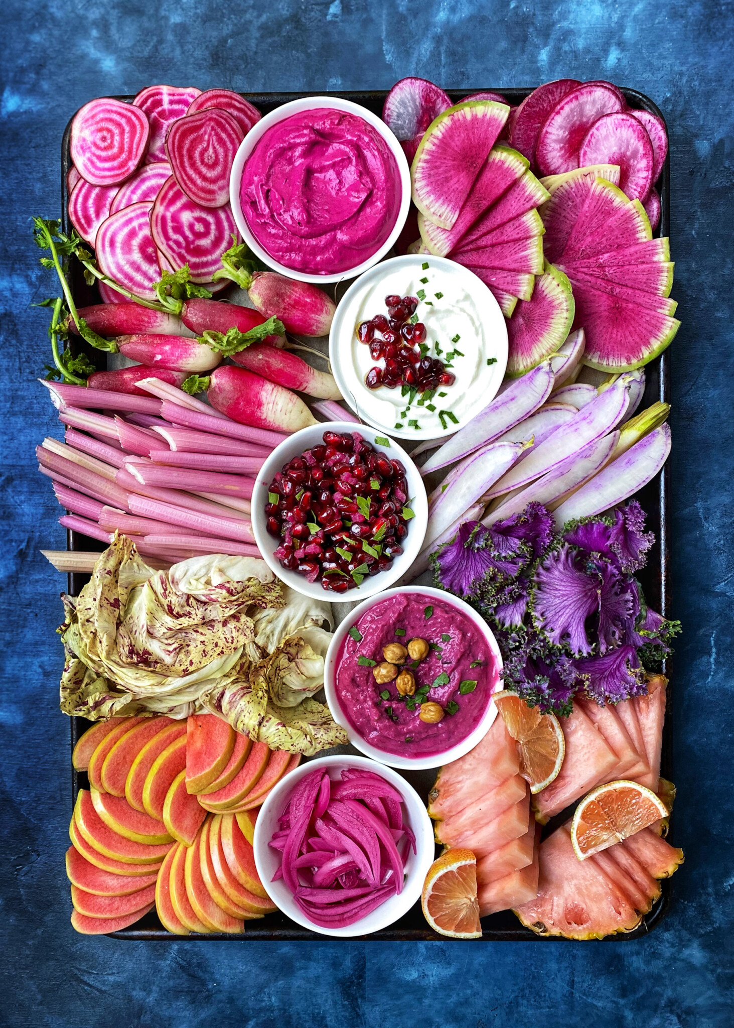 beet yogurt dip on winter pink and purple crudites platter