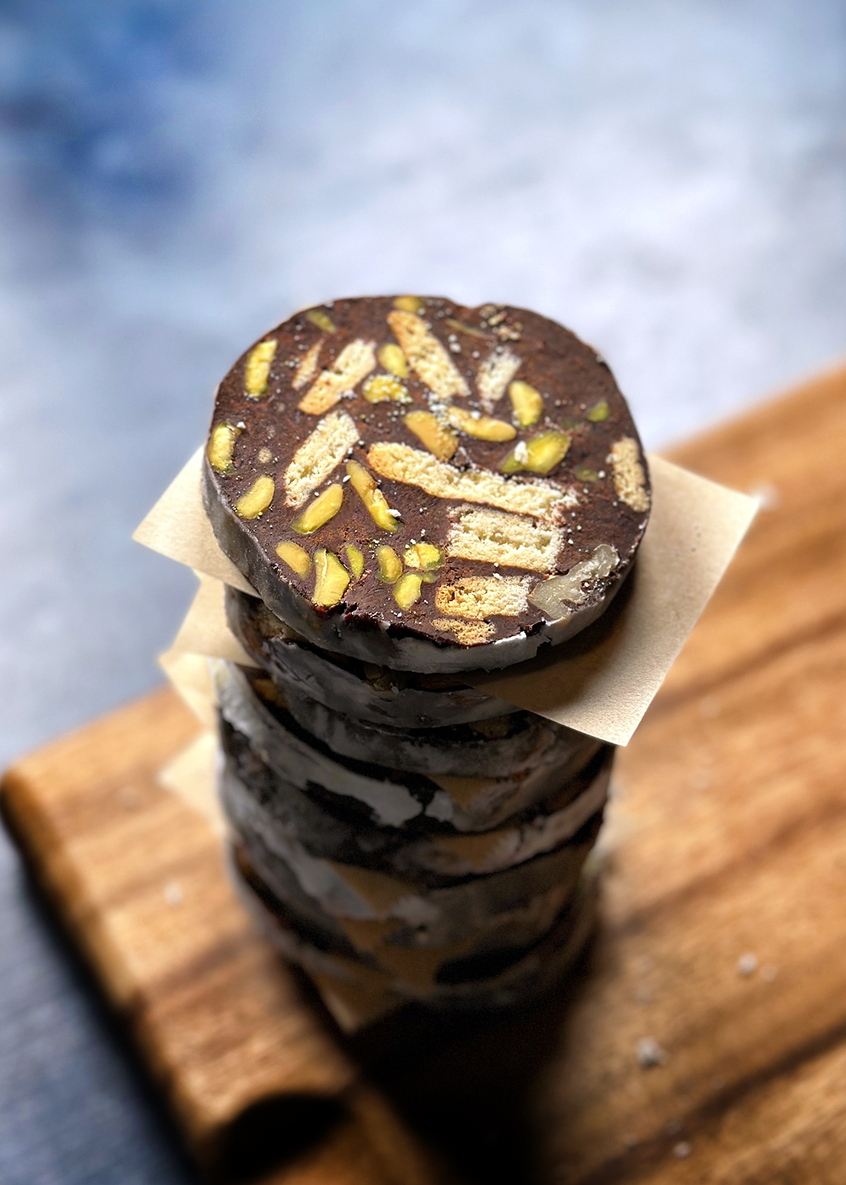 chocolate salami slices, separated with parchment paper for storage