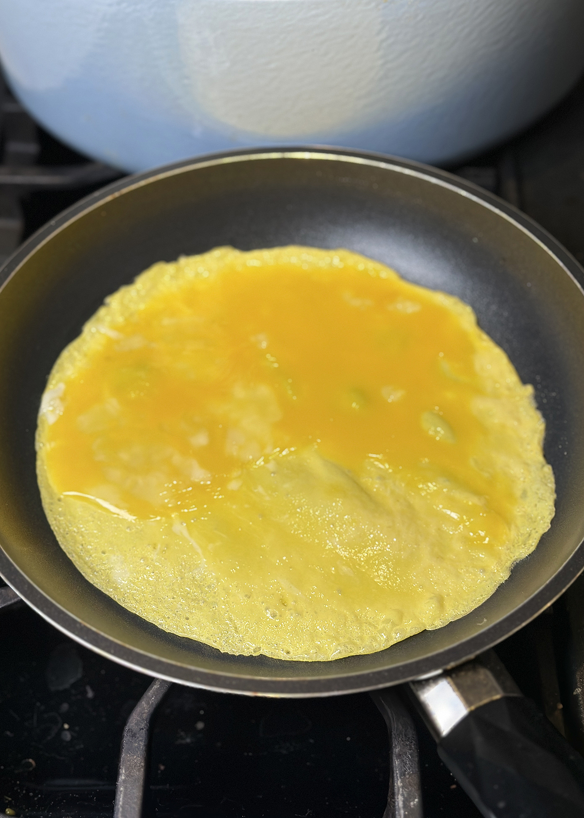 egg yolk omelet crepe in pan