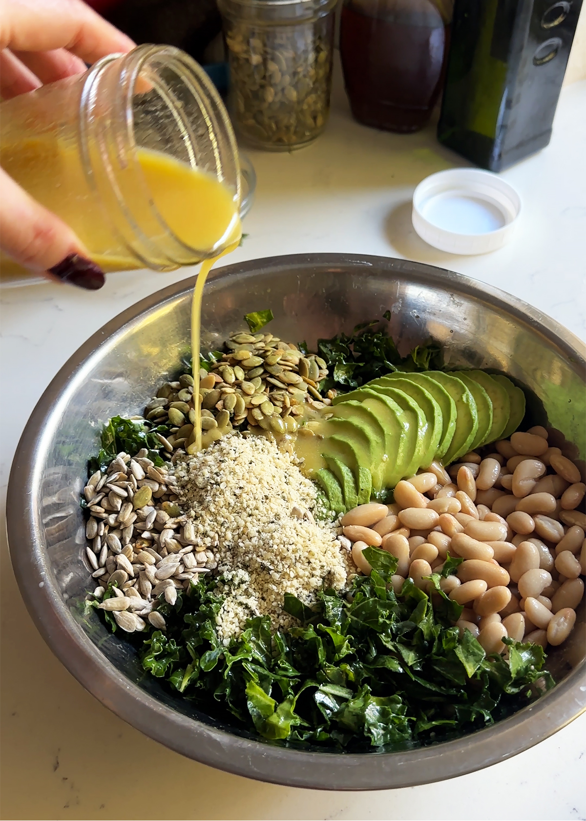 lemon dressing on kale white bean salad