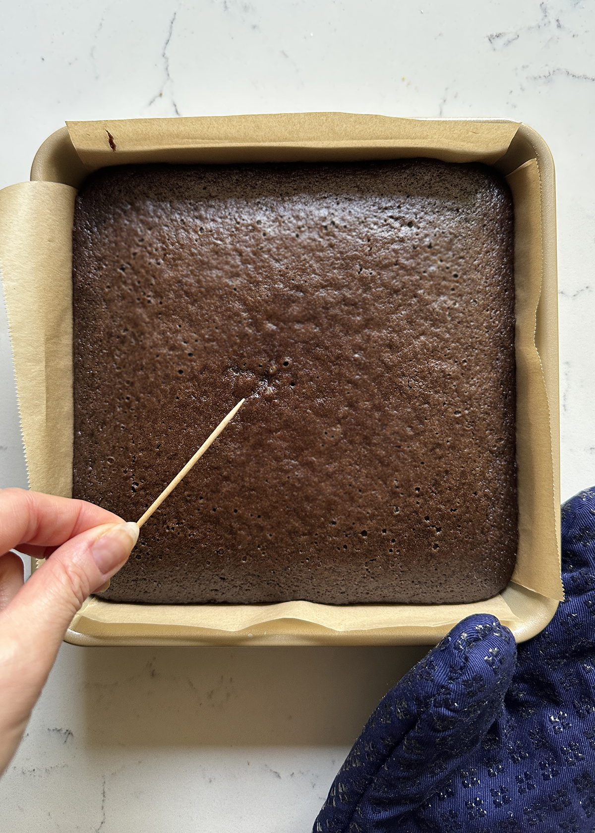 eggless chocolate cake baked in pan