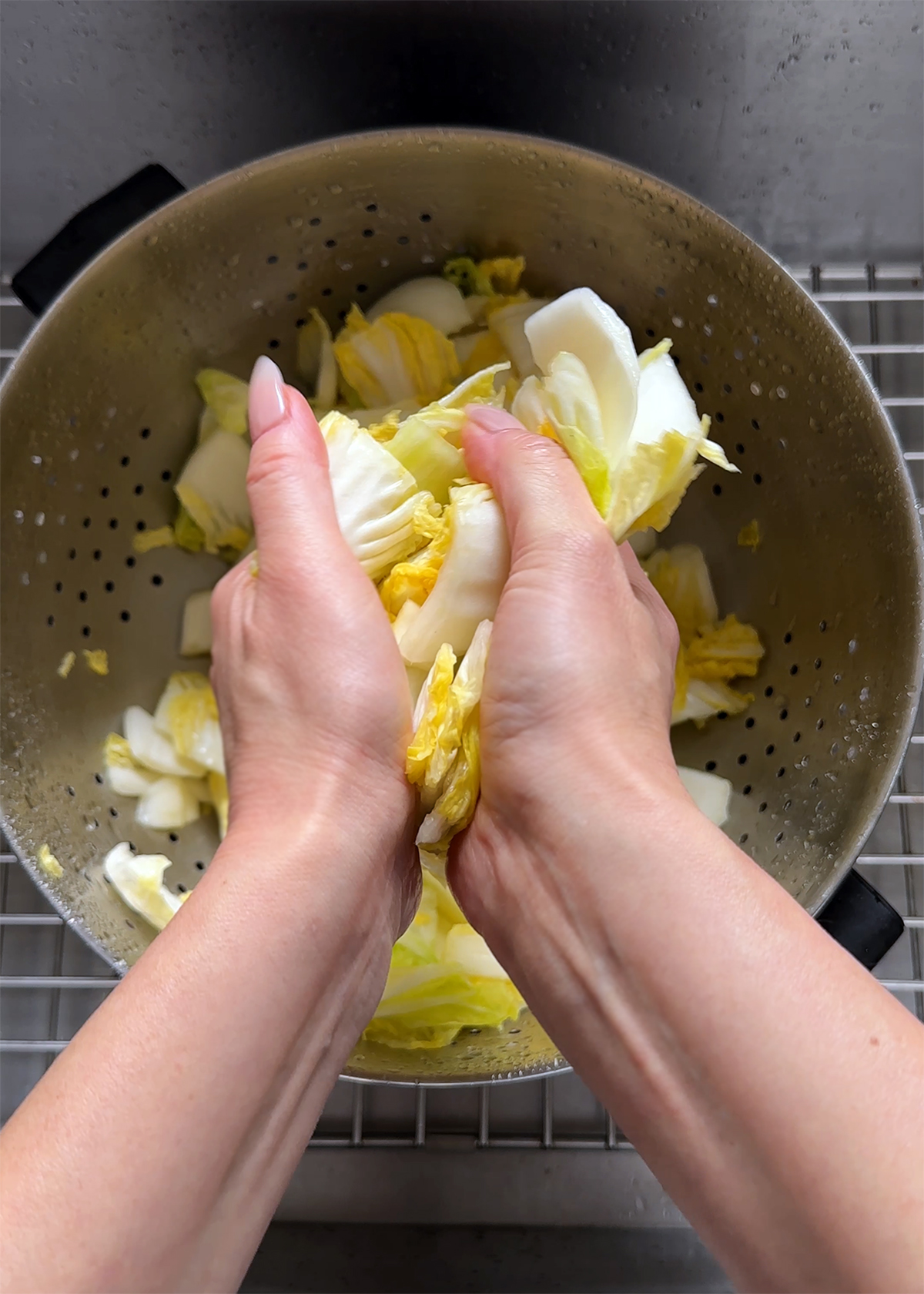squeezing water from cabbage by hand