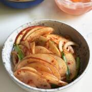 apple kimchi in serving bowl