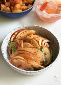 apple kimchi in serving bowl