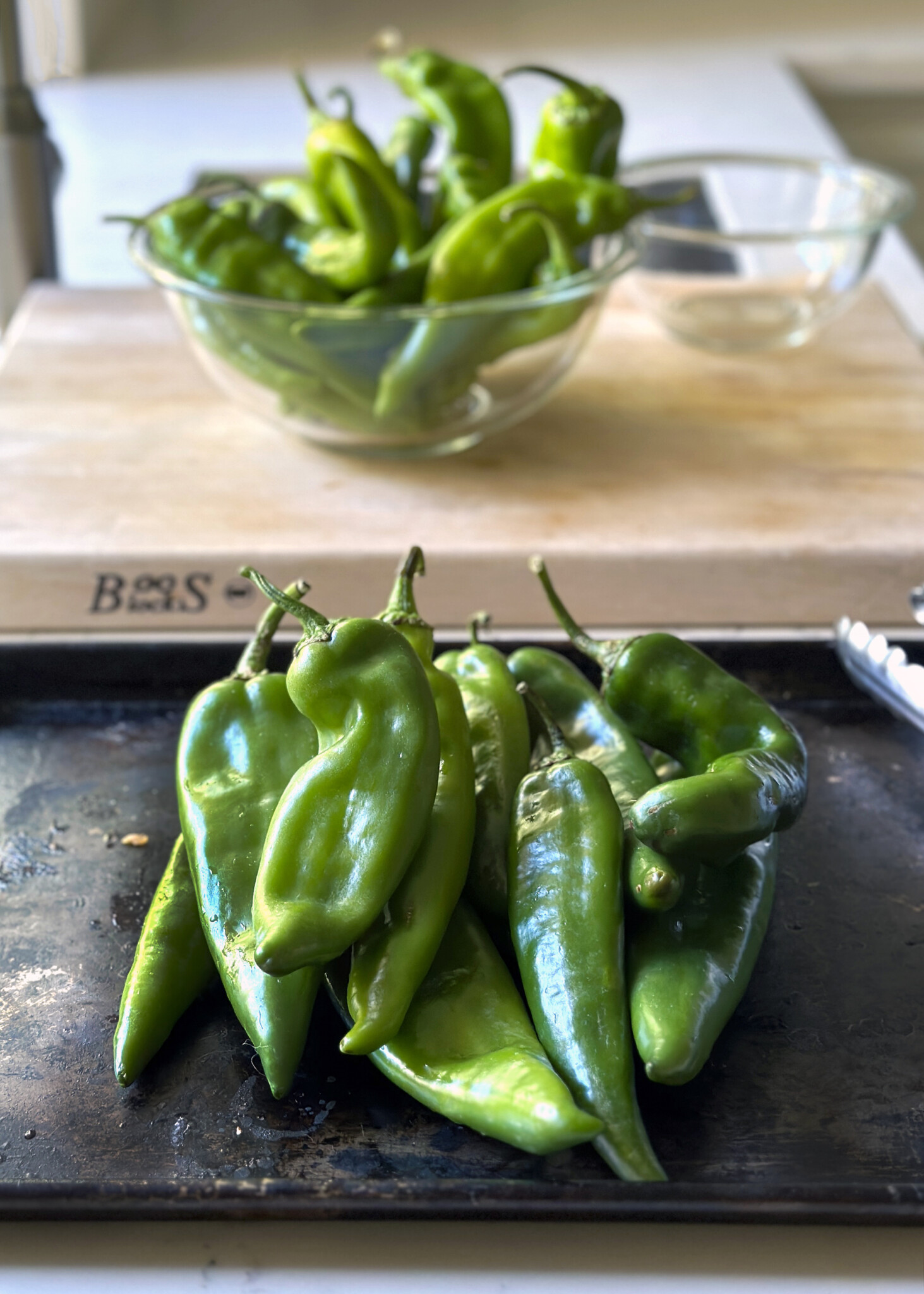 hatch chile peppers on baking sheet