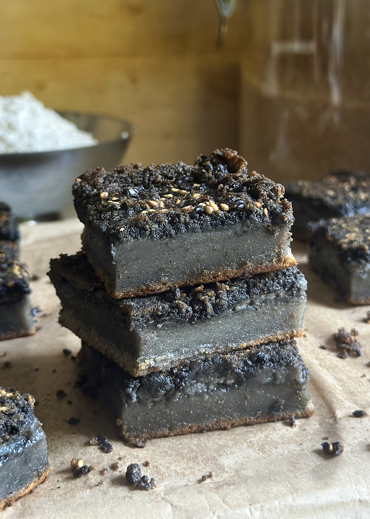 black sesame mochi cake pieces stacked
