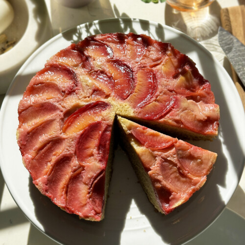 plum cake on cake stand