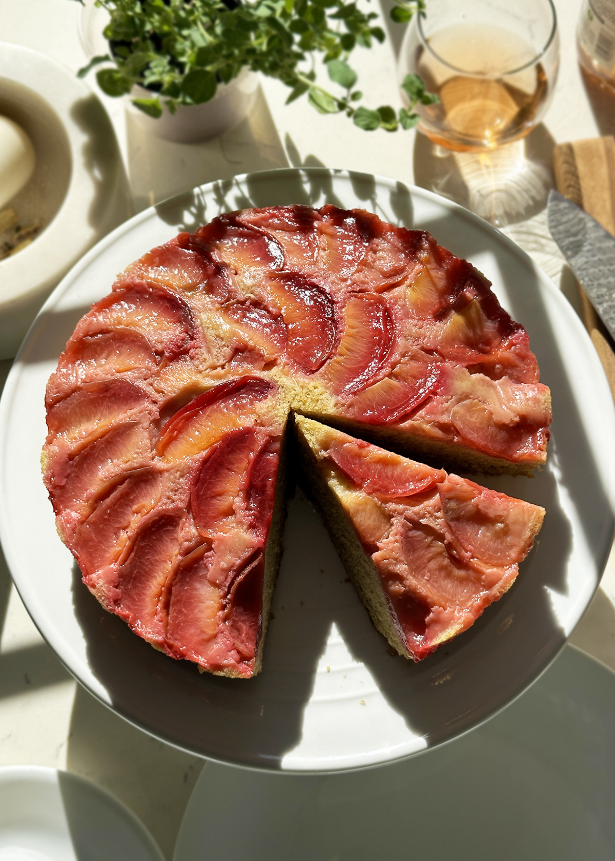 plum cake on cake stand