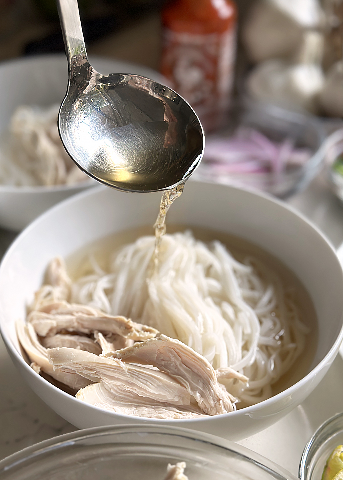 hot pho broth ladle