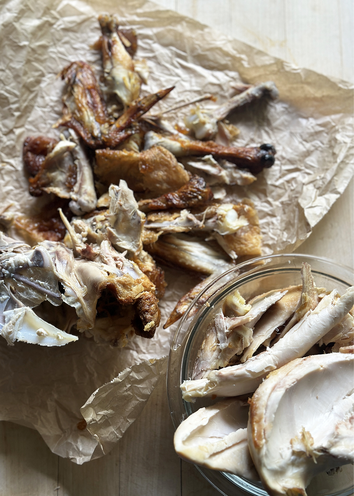 rotisserie chicken, bones and meat separated