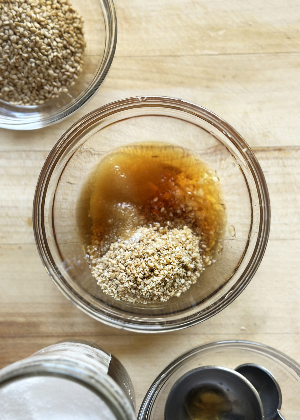garlic sesame salt in mixing bowl for japanese cabbage salad