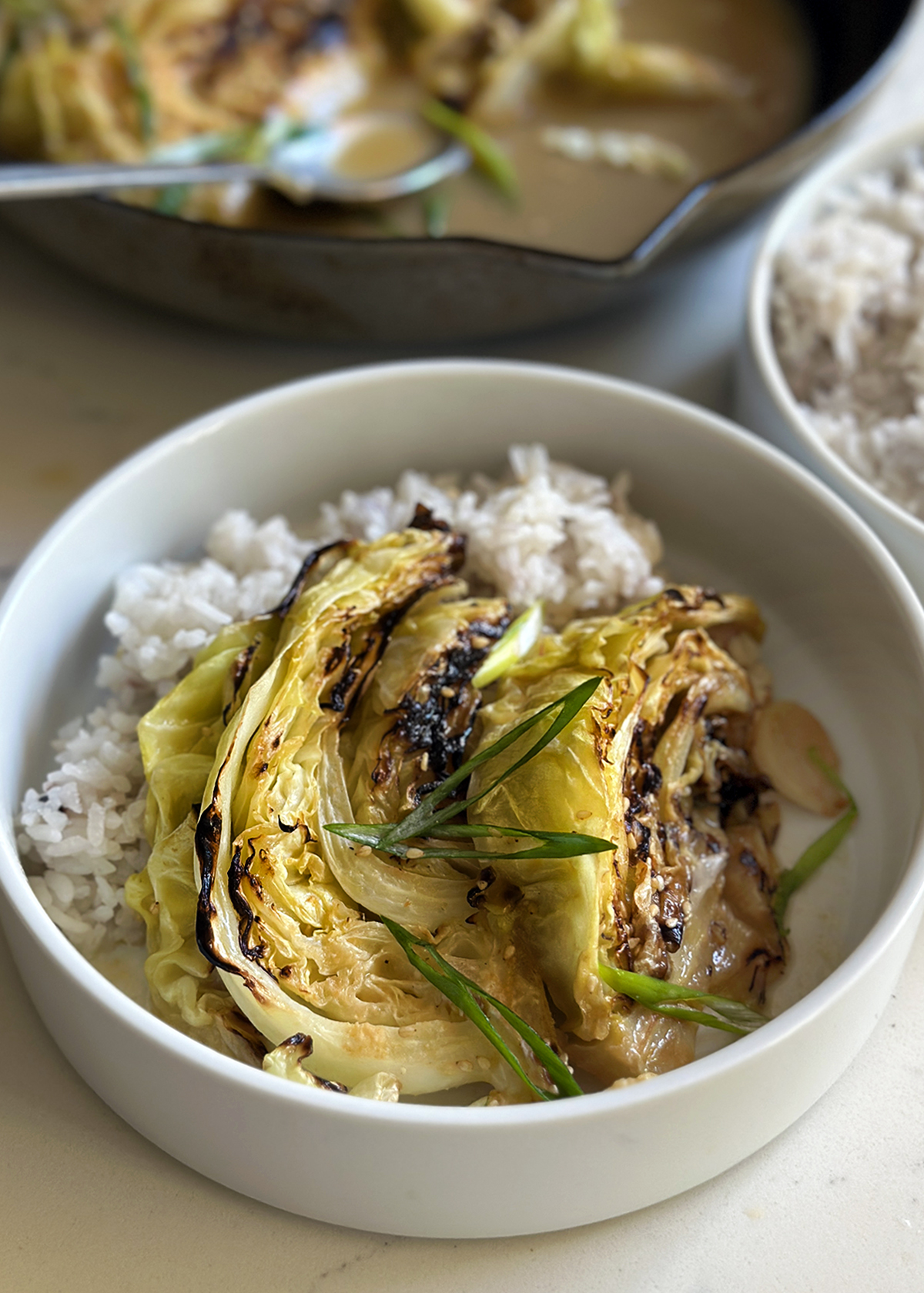 miso braised cabbage wedges on rice