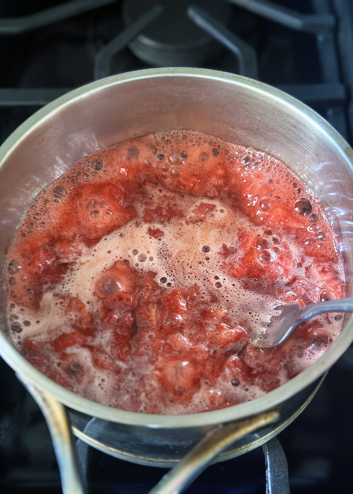 strawberries simmering in pot